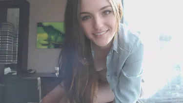 Beautiful girl in shirt-sleevs does fingering