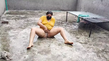 Desi MUMMY Mommy and Pakistani Dame Get Raw and Horny in the Rain