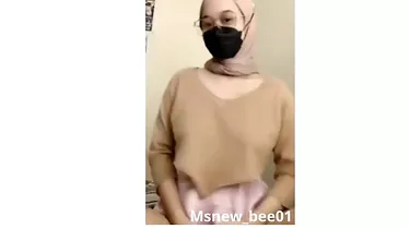 Observe this hijab-wearing teenager with giant innate boobies gusto herself in a insatiable hijab-wearing session