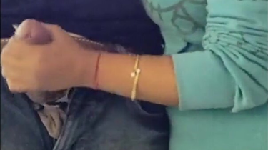 Desi Indian girl with massive tits jerks off her man's dick