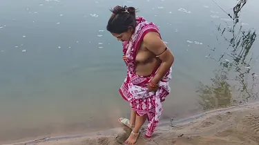 Desi Aunty enjoys a steamy outdoor shower with her busty Indian husband